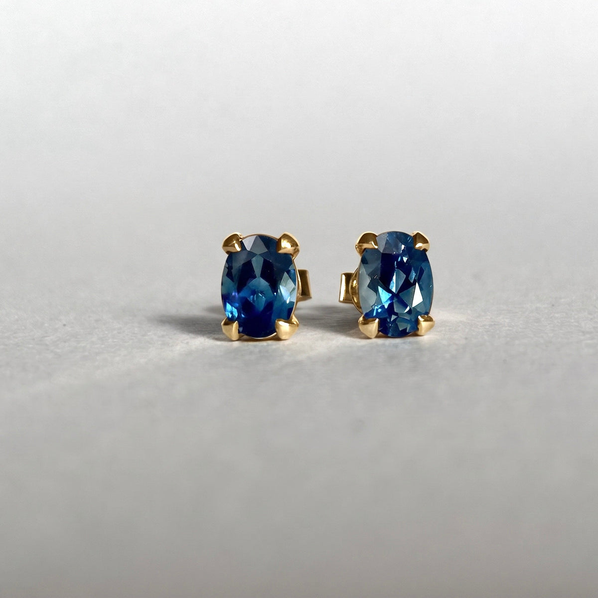 Petal Stud Earrings featuring 7x5mm oval cut Australian Sapphires 